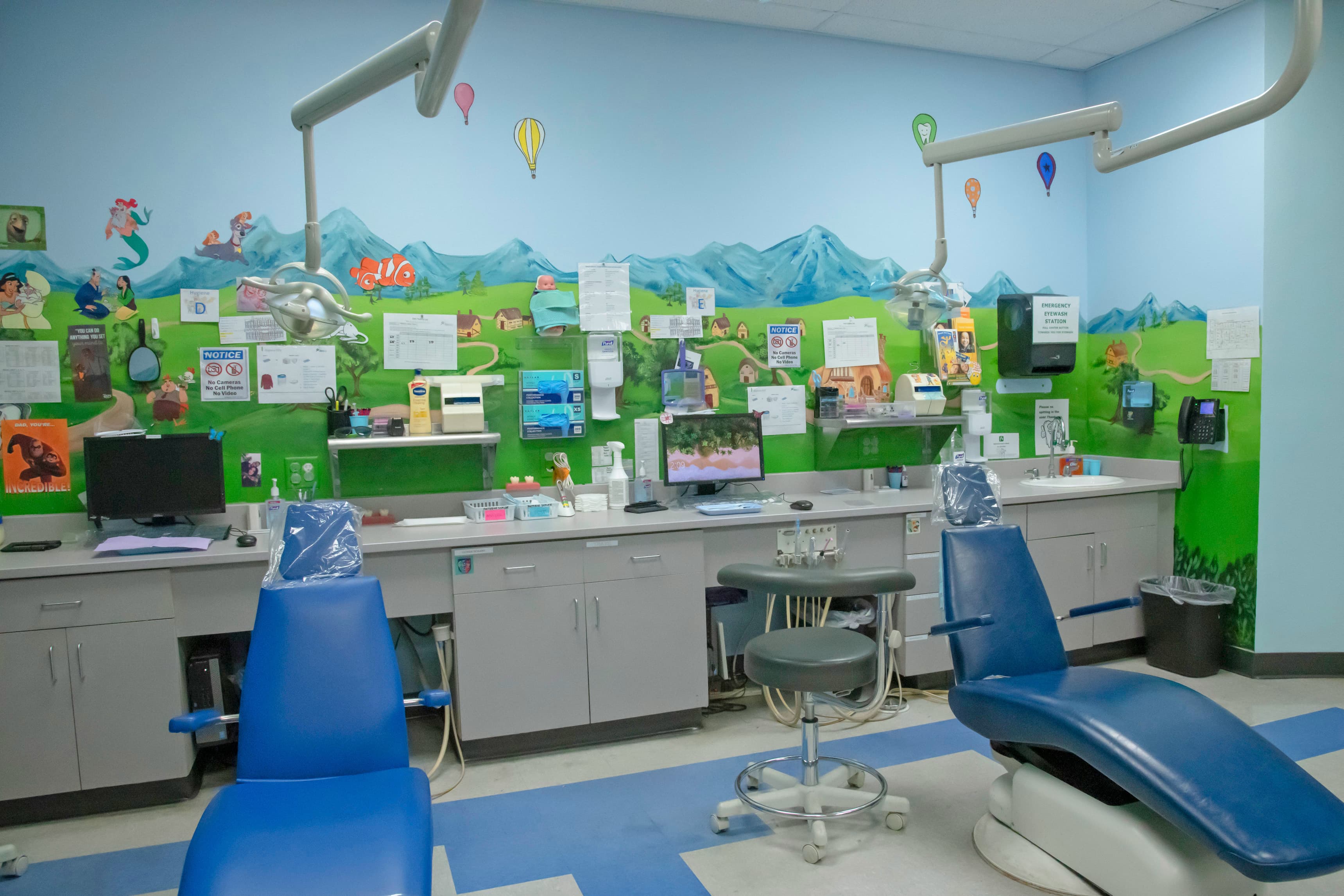 operatory room for pediatric dentistry with two dental chairs