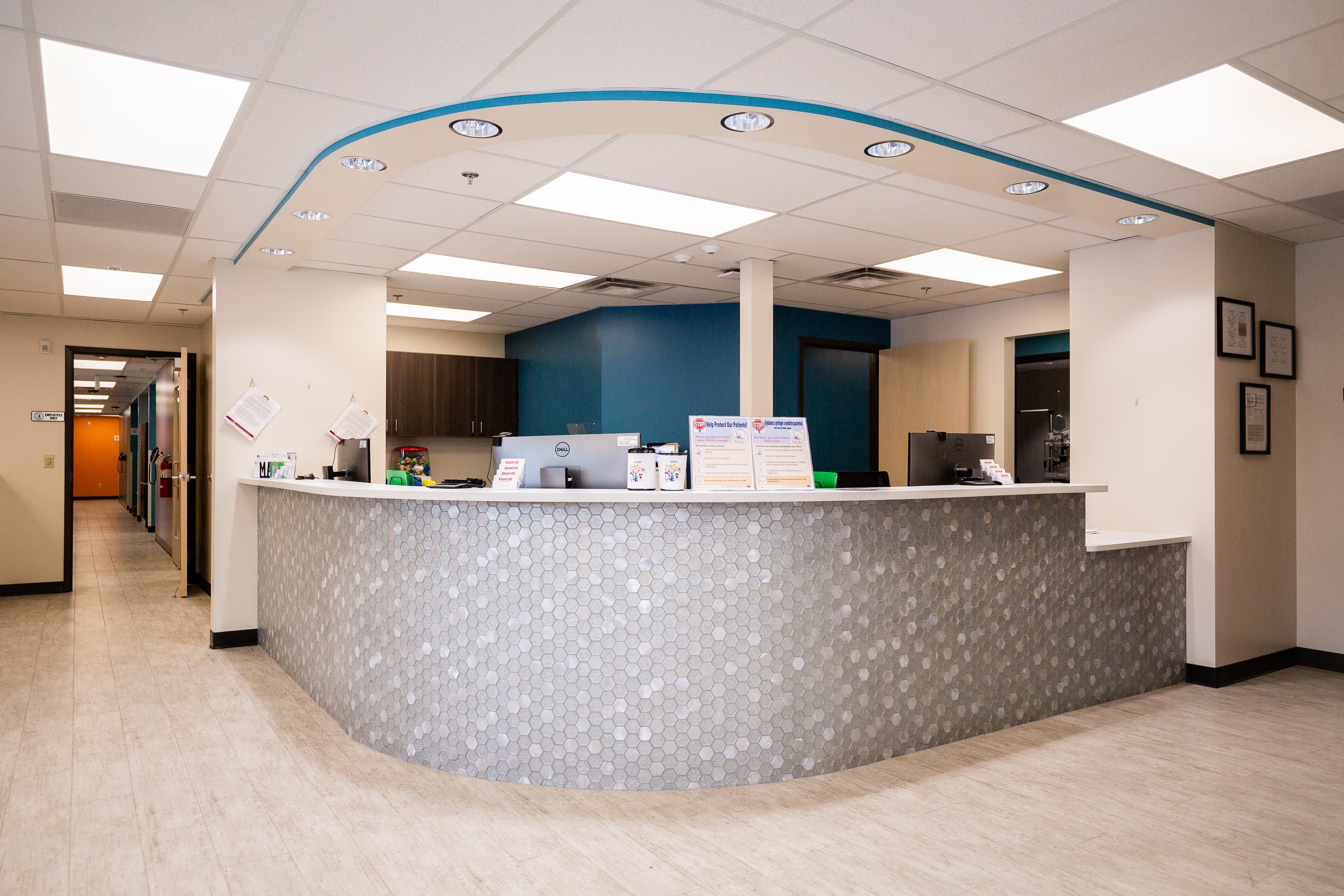 curved reception desk in a dental office
