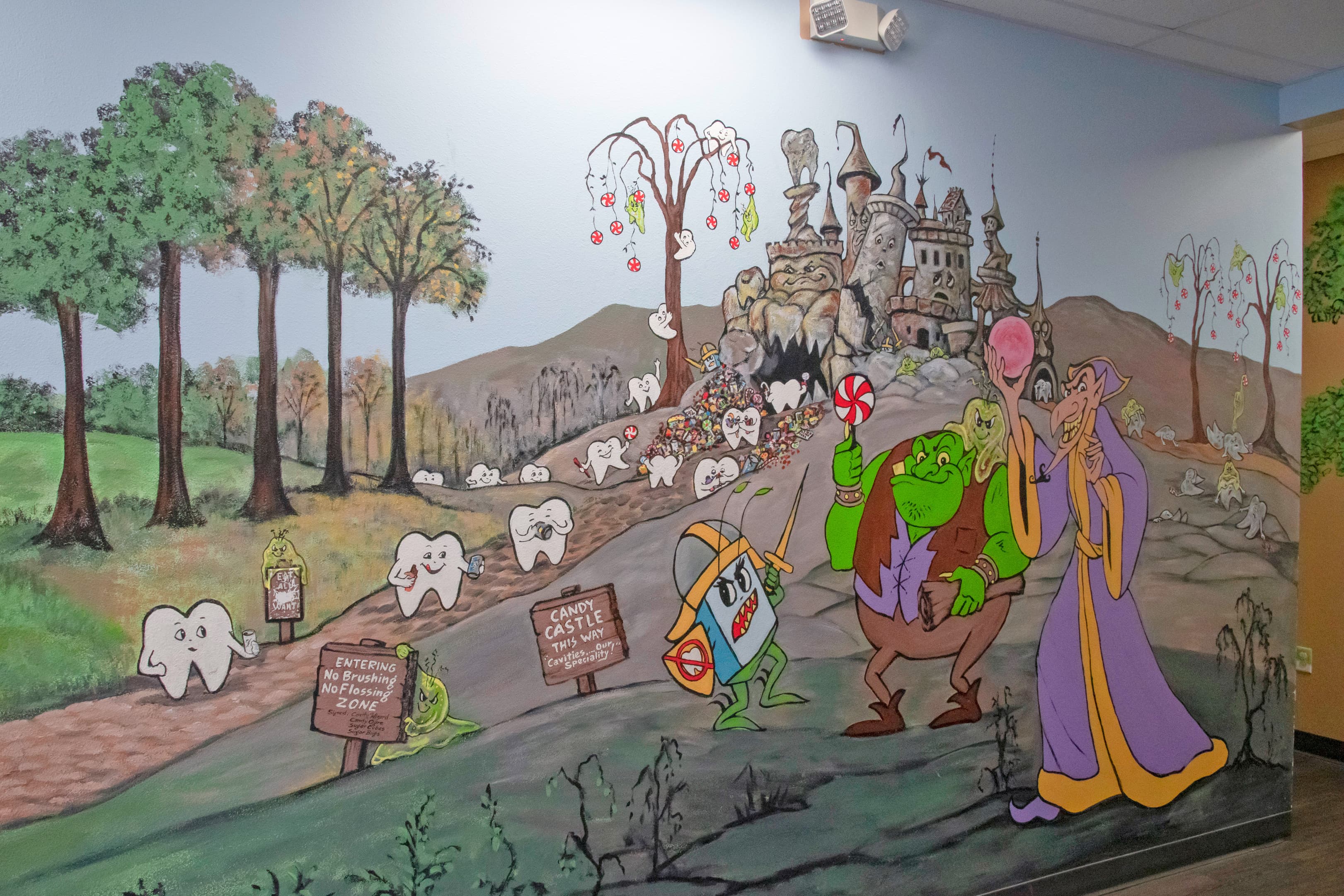 mural inside a kid's dentist office with cartoon characters