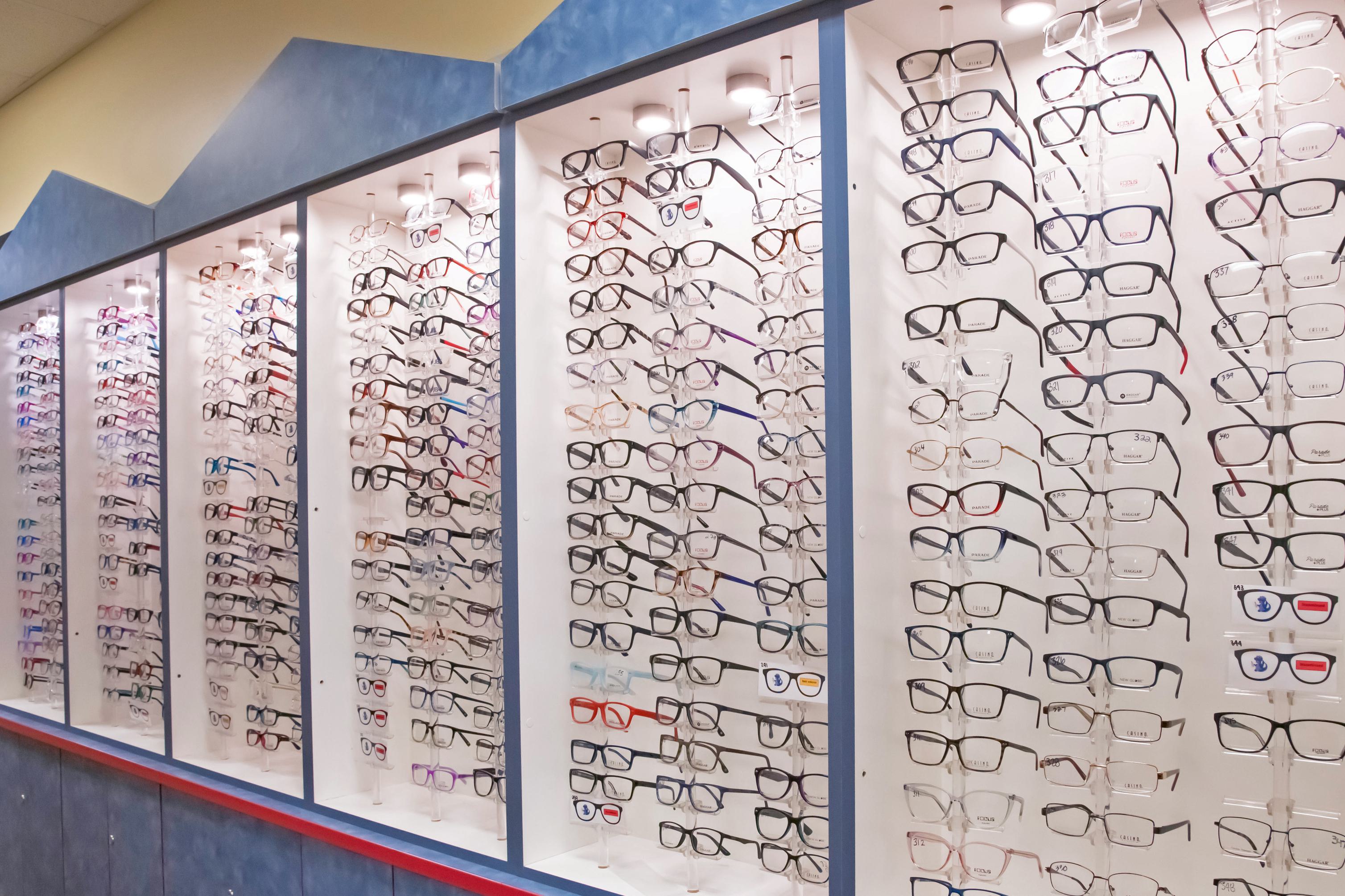 Huge wall displaying children's glasses