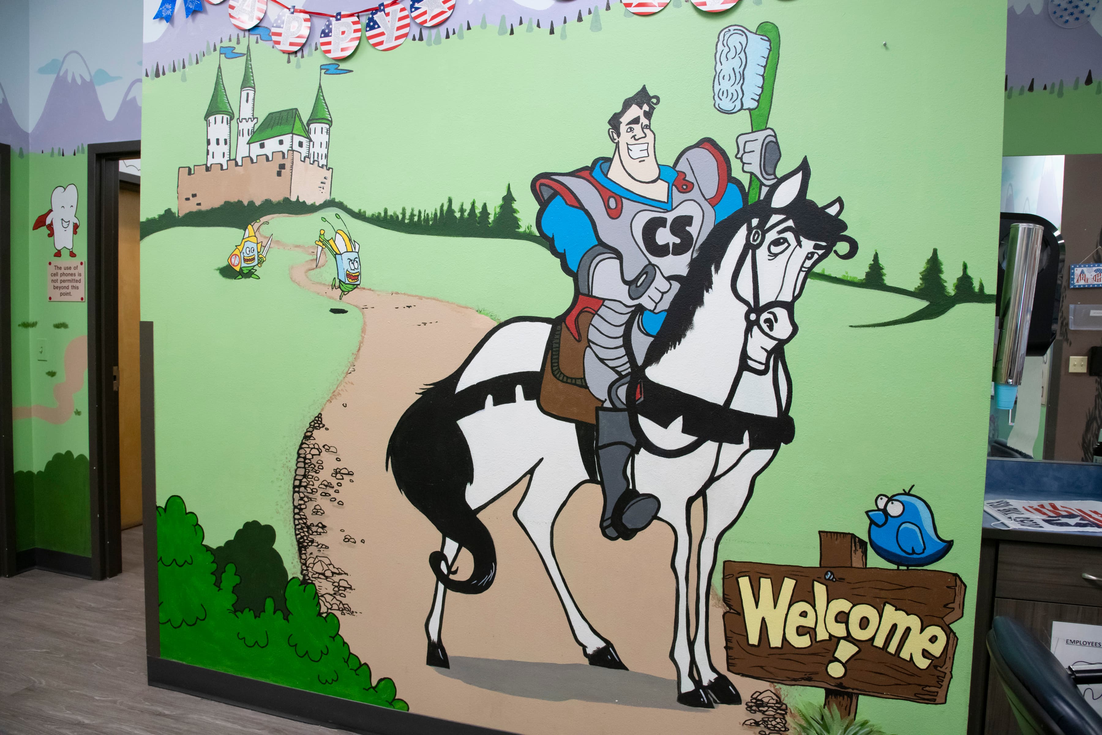Graphics of Captain Smiles riding a horse and holding a toothbrush