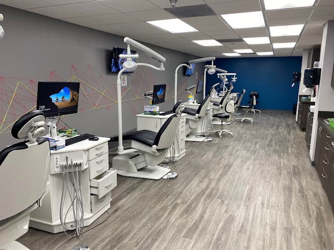 Dental and orthodontic operatory room with five dental chairs in a modern designed space