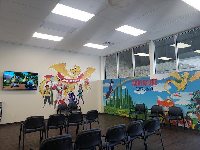 pediatric dental waiting room with colorful wall murals
